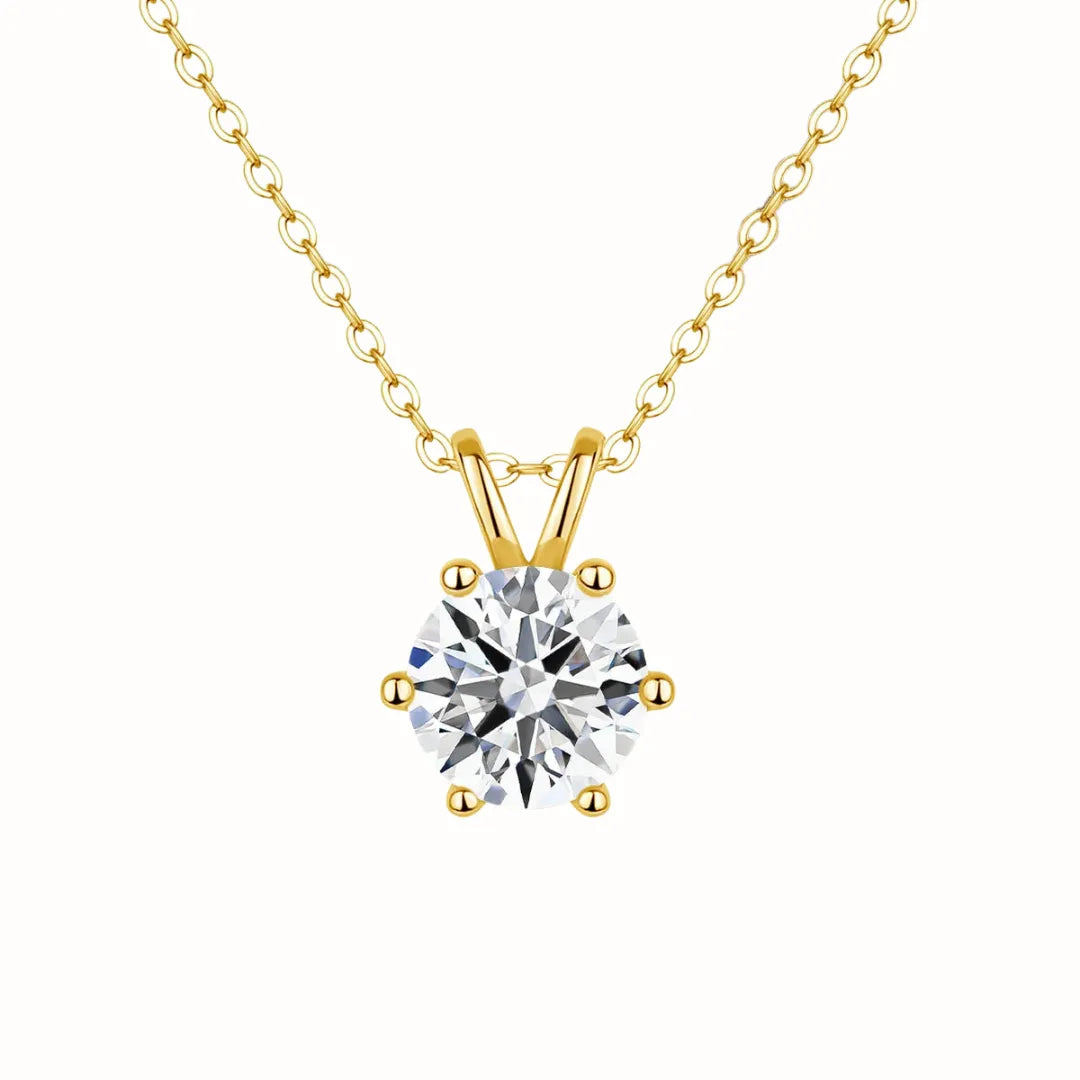 Prata 925 banhada a Ouro 14k.
Pedra: Moissanita 2,0 ct (quilates).