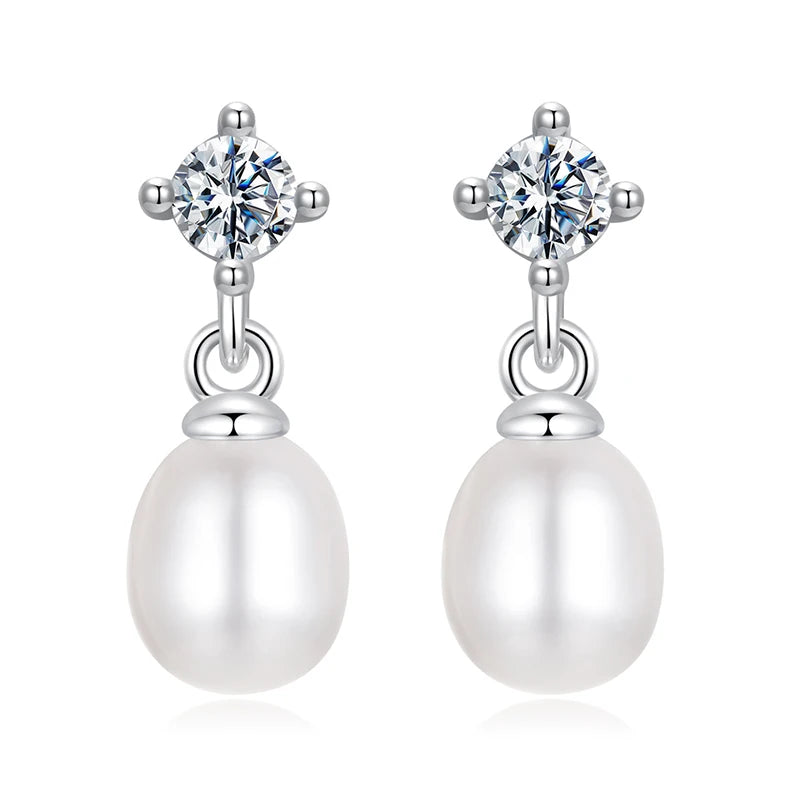 Prata 925.
Pedras: Pérola e Moissanita - 1.0 ct (quilate).