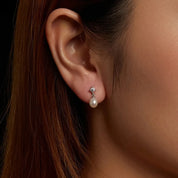 Prata 925.
Pedras: Pérola e Moissanita - 1.0 ct (quilate).